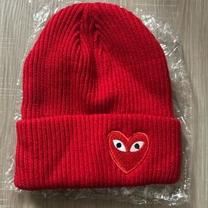 Heart Eyes Beanie Hat Brand New in package. Never worn